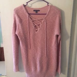 Sweater with lace up neck